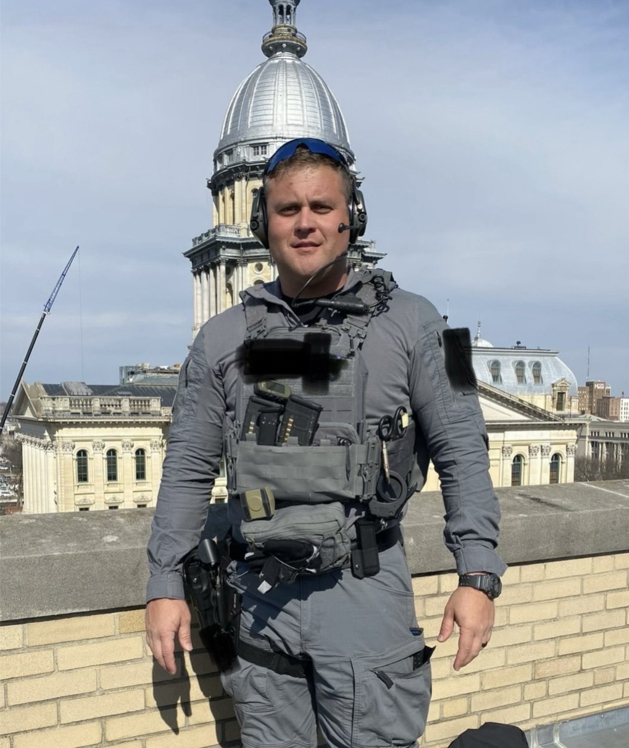 Cody Rose in tactical kit outside the Illinois State Capitol in Springfield.